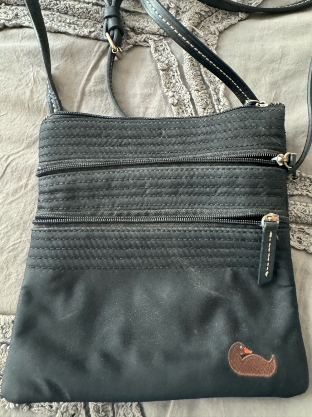 Dooney & Bourke Black Crossbody Bag with Brown Embroidered Accent